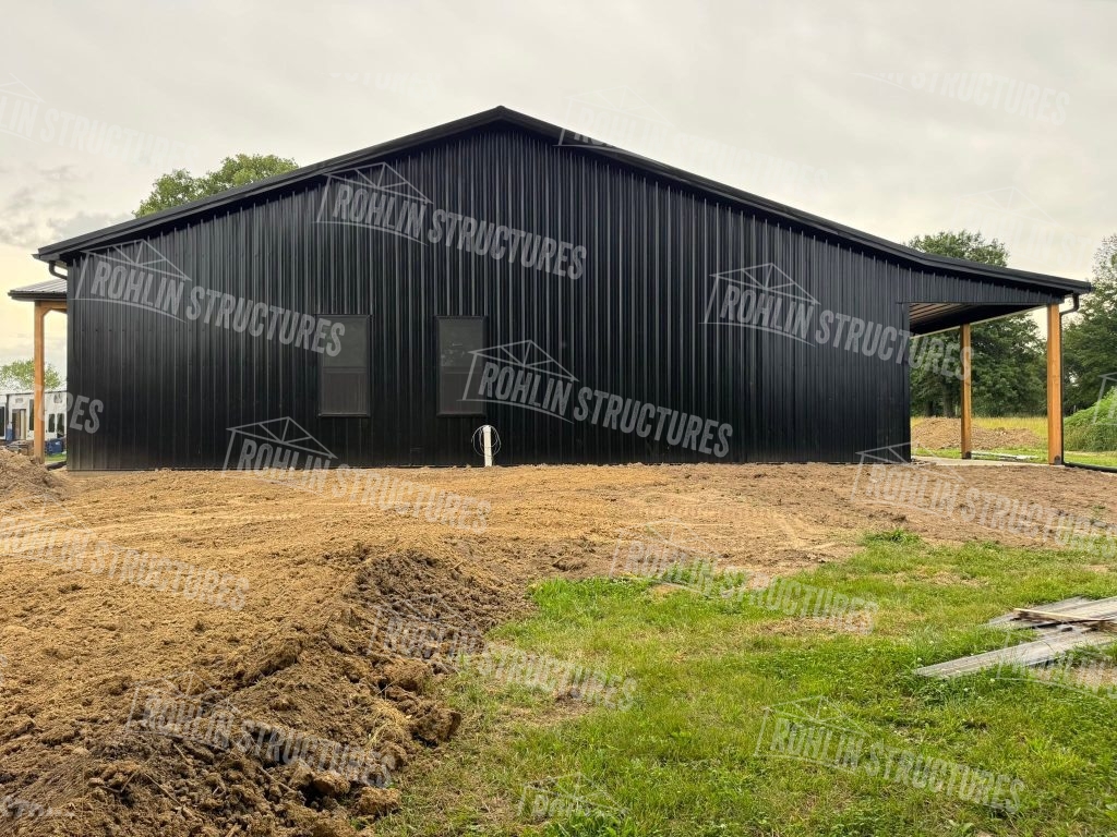 Rohlin Structures post-frame structure and barndominium, black exterior, porch, Missouri.