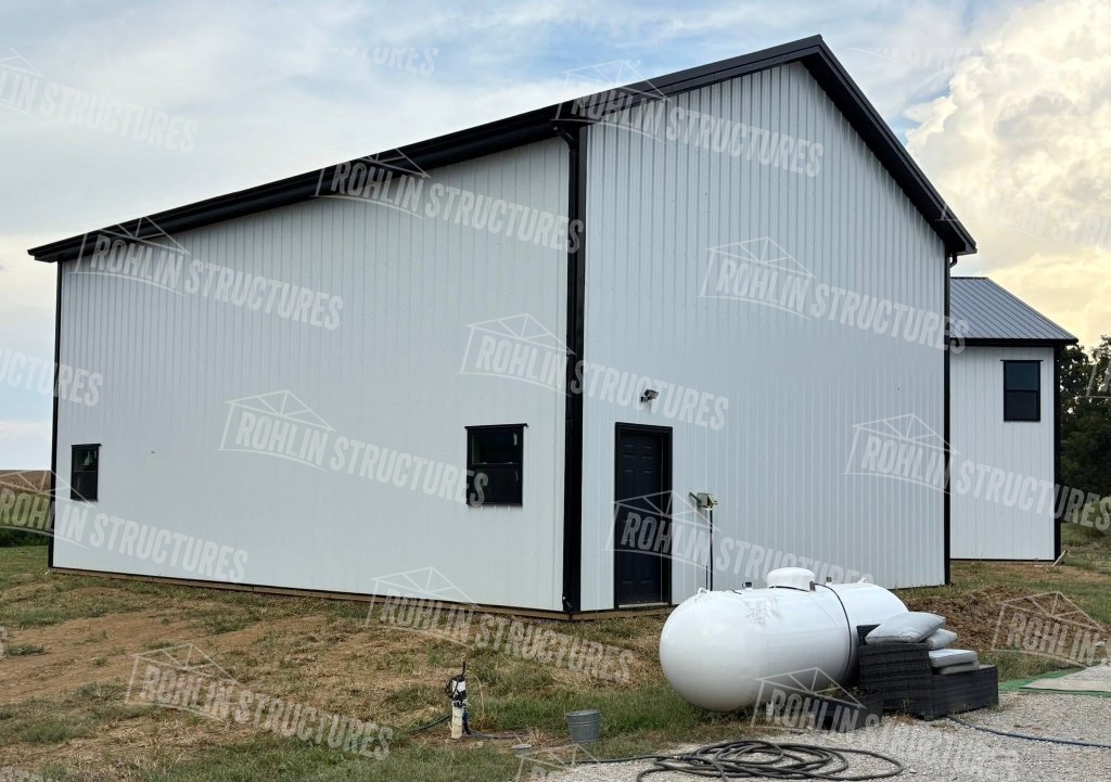 Rohlin Structures barndominium with timber gable and concrete foundation, Missouri.