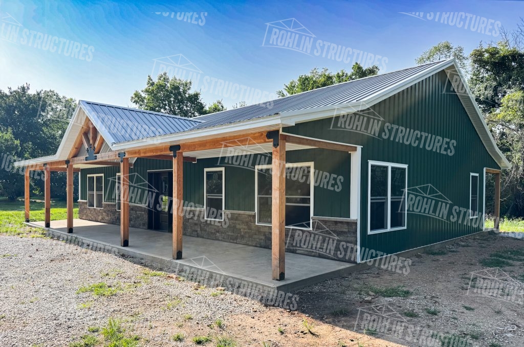 Custom barndominium with front and back porches and timber framing by Rohlin Structures in Missouri.