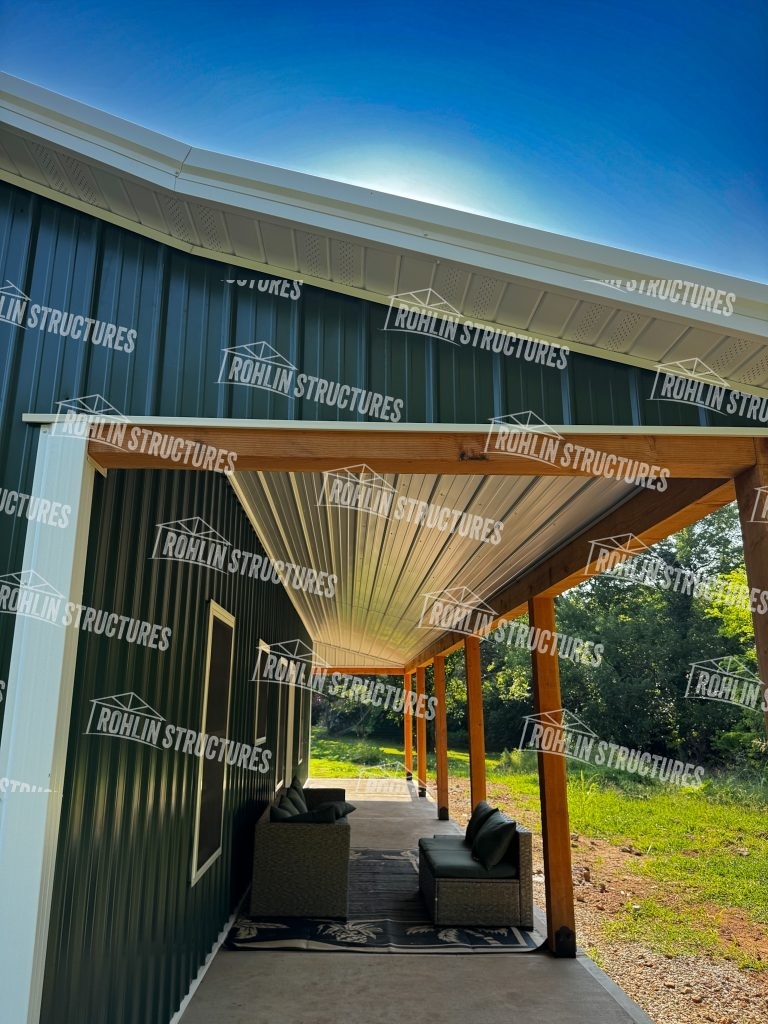 Rohlin Structures pole barn with front and back porches and timber frame details.