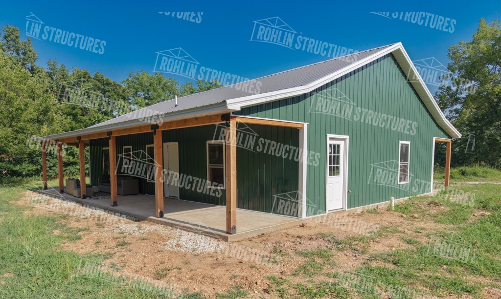 Custom barndominium with front and back porches and metal roof by Rohlin Structures in Missouri.