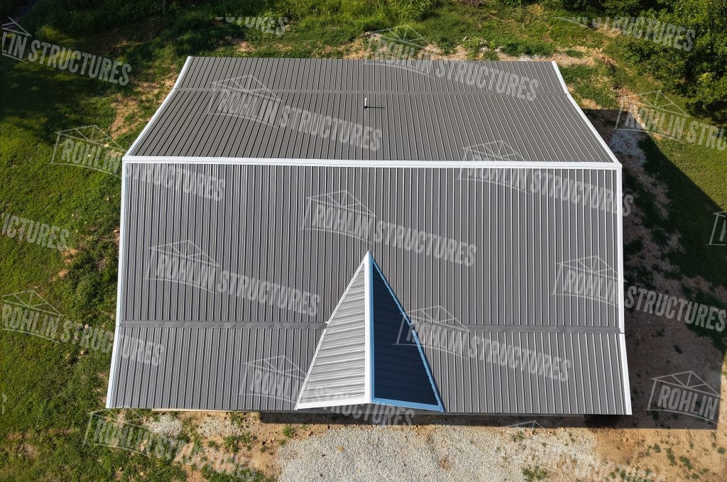 Aerial view of a completed Rohlin Structures pole barn showcasing durable metal roofing and construction