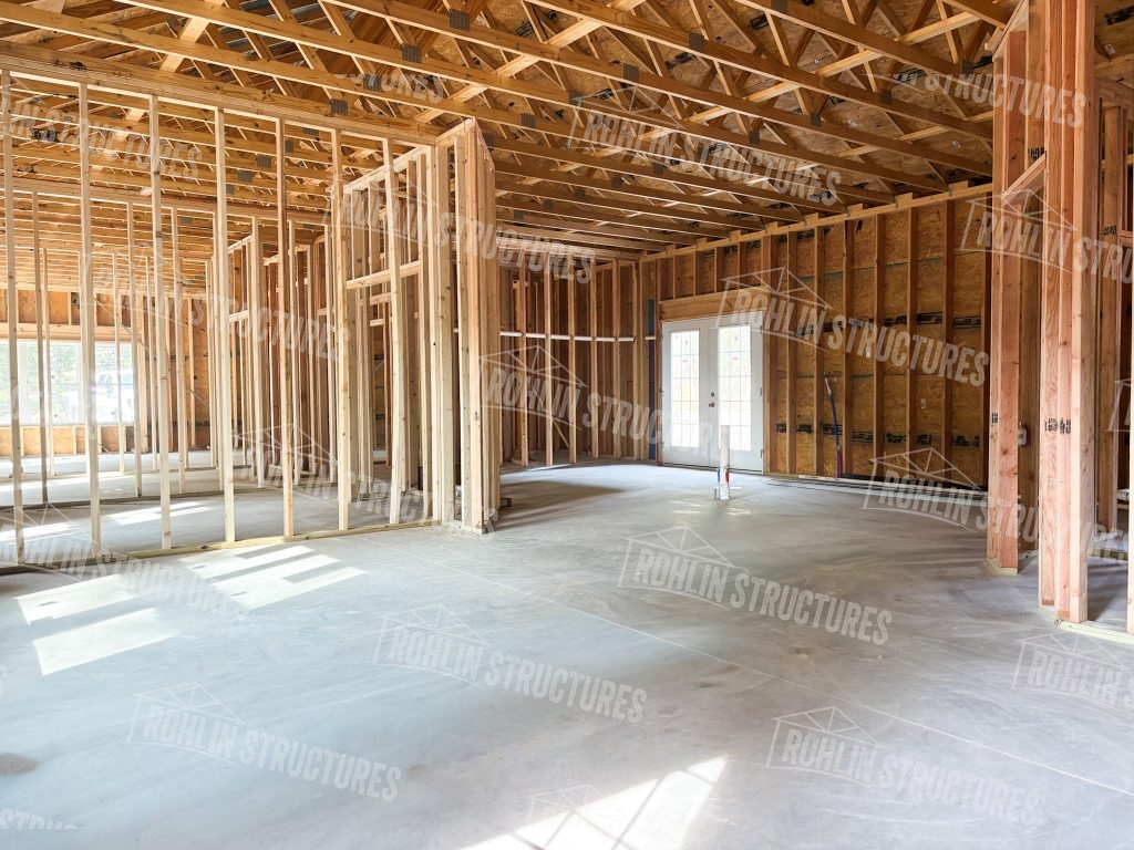 Interior framing of a custom barndominium by Rohlin Structures in Missouri.