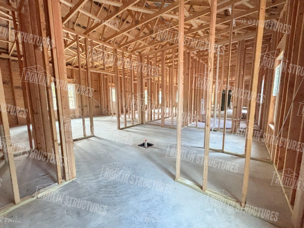 Interior framing of a custom barndominium under construction by Rohlin Structures in Missouri.