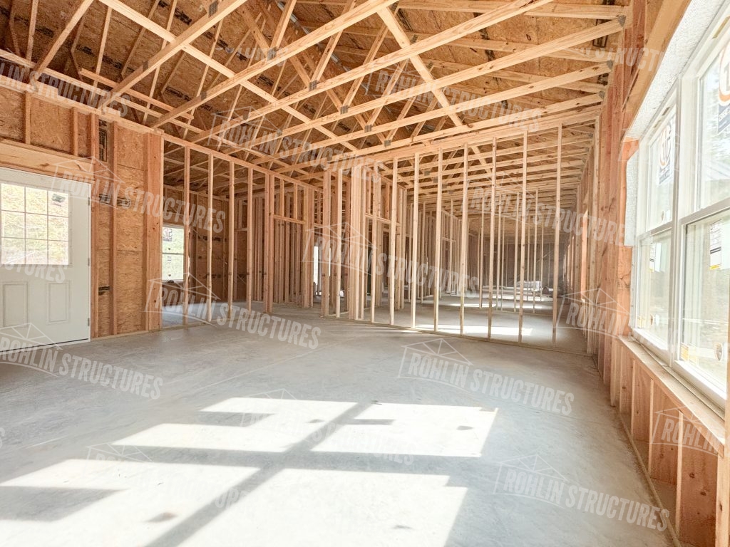 Interior view of a custom barndominium under construction by Rohlin Structures in Missouri.