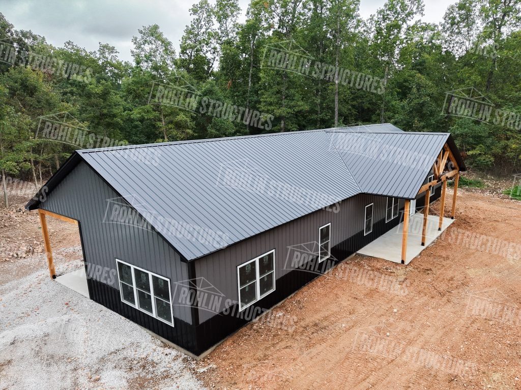 Custom barndominium built by Rohlin Structures in Missouri, featuring a dark gray metal roof.